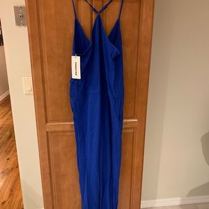 Blue jumpsuit. Brand new. Tags still on.